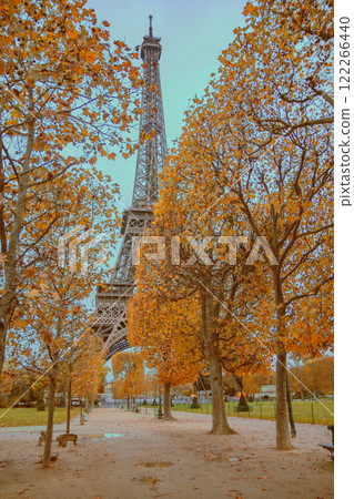 Evening autumn view of the Eiffel Tower in Paris. Evening autumn view of the Eiffel Tower in Paris. 122266440