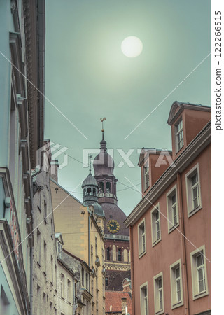 Riga Church of St. Peter in the misty mystical light of the morning sun. 122266515