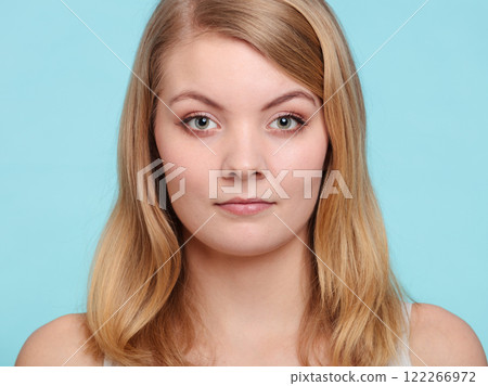 Pretty woman with long hair. 122266972