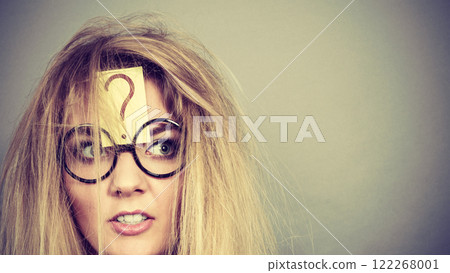 Tired crazy woman after intensive thinking Tired crazy woman after intensive thinking 122268001