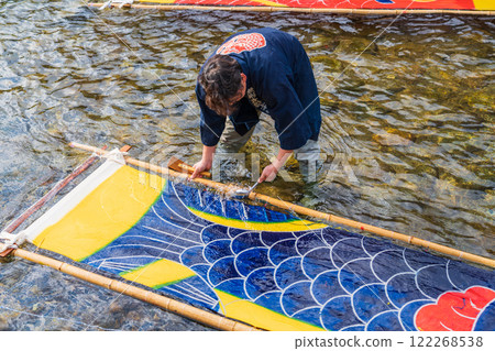 A seasonal feature of winter in Gujo: Gujo-dyed carp streamers left out in the cold (Gujo City, Gifu Prefecture) A seasonal feature of winter in Gujo: Gujo-dyed carp streamers left out in the cold (Gujo City, Gifu Prefecture) 122268538