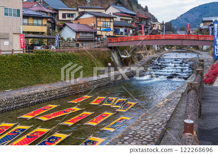 A seasonal feature of winter in Gujo: Gujo-dyed carp streamers left out in the cold (Gujo City, Gifu Prefecture) 122268696
