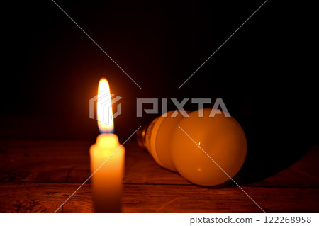 candle glowing in the dark 122268958