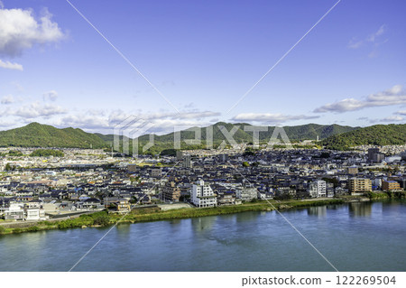 View of Kakamigahara and Unuma across the Kiso River from Inuyama Castle. Inuyama City, Aichi Prefecture. View of Kakamigahara and Unuma across the Kiso River from Inuyama Castle. Inuyama City, Aichi Prefecture. 122269504