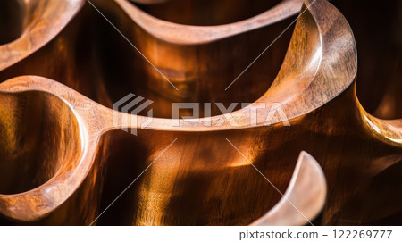 Intricate design of polished metal sculpture 122269777