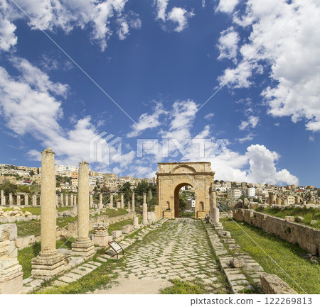 Roman ruins (against the background of a beautiful sky with clouds) in the Jordanian city of Jerash (Gerasa of Antiquity), capital and largest city of Jerash Governorate, Jordan Roman ruins (against the background of a beautiful sky with clouds) in the Jordanian city of Jerash (Gerasa of Antiquity), capital and largest city of Jerash Governorate, Jordan 122269813