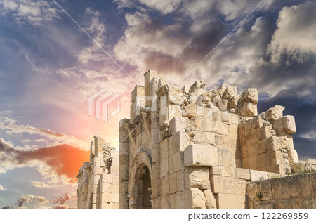 Roman ruins (against the background of a beautiful sky with clouds) in the Jordanian city of Jerash (Gerasa of Antiquity), capital and largest city of Jerash Governorate, Jordan Roman ruins (against the background of a beautiful sky with clouds) in the Jordanian city of Jerash (Gerasa of Antiquity), capital and largest city of Jerash Governorate, Jordan 122269859