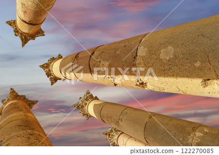 Roman Columns in the Jordanian city of Jerash (Gerasa of Antiquity), capital and largest city of Jerash Governorate, Jordan. Against the background of a beautiful sky with clouds Roman Columns in the Jordanian city of Jerash (Gerasa of Antiquity), capital and largest city of Jerash Governorate, Jordan. Against the background of a beautiful sky with clouds 122270085