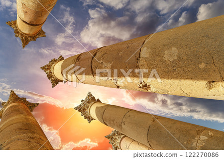Roman Columns in the Jordanian city of Jerash (Gerasa of Antiquity), capital and largest city of Jerash Governorate, Jordan. Against the background of a beautiful sky with clouds Roman Columns in the Jordanian city of Jerash (Gerasa of Antiquity), capital and largest city of Jerash Governorate, Jordan. Against the background of a beautiful sky with clouds 122270086