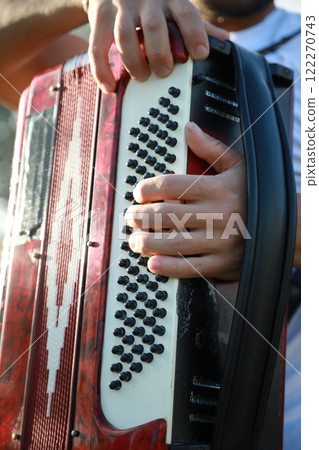 Hand Of A Professional Accordion Player  122270743