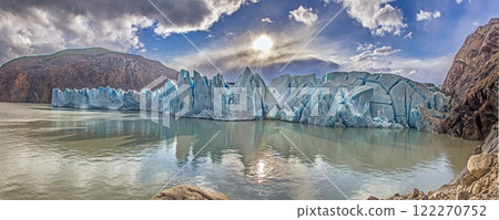 Closeup of Grey Glaciers calving front with icy peaks and reflections in Torres del Paine National Park 122270752