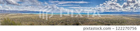Panoramic view of Perito Moreno Glacier Lake surrounded by vast steppe and distant mountains Panoramic view of Perito Moreno Glacier Lake surrounded by vast steppe and distant mountains 122270756