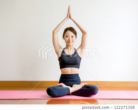 Woman doing yoga 122271108