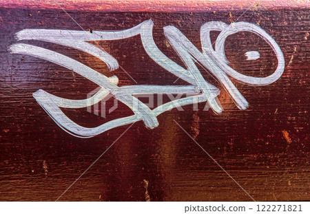 Graffiti on a wooden garden bench Graffiti on a wooden garden bench 122271821