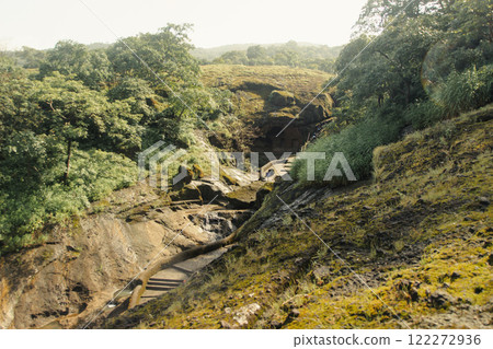 Kanheri Caves in the forests of the Sanjay Gandhi National Park, India	 122272936