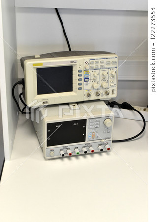 An electronic oscilloscope in the laboratory. A device for measuring voltage. An electronic oscilloscope in the laboratory. A device for measuring voltage. 122273553