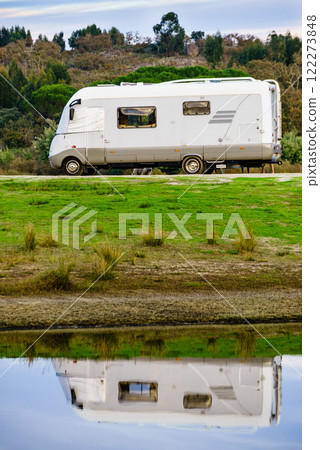 Camper rv camping at lake shore. Alentejo Portugal. 122273848