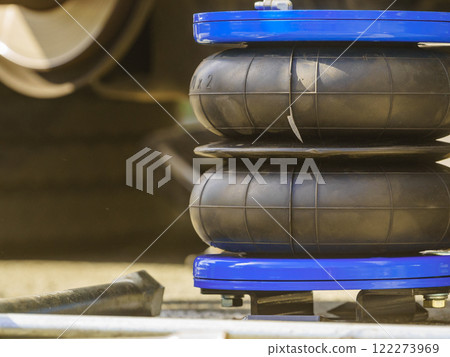 Car in service. Installing air ride suspension. Car in service. Installing air ride suspension. 122273969