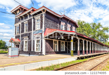 Provincial railway station with an old wooden passenger terminal Provincial railway station with an old wooden passenger terminal 122274095