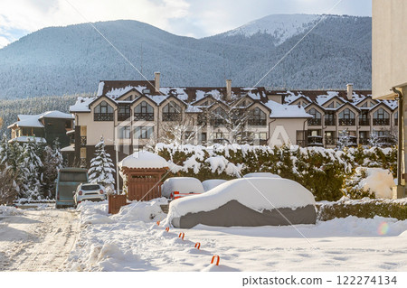 Bansko, Bulgaria winter street view and mountains Bansko, Bulgaria winter street view and mountains 122274134