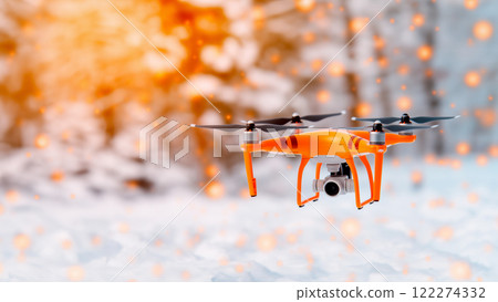 A Flying Drone Captured in a Beautiful Winter Landscape with a Snowy Background View, copy space A Flying Drone Captured in a Beautiful Winter Landscape with a Snowy Background View, copy space 122274332