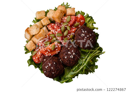 Hearty delicious fried falafel made from chickpeas, cumin, hummus with salt and spices 122274867