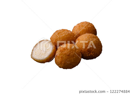 French fries balls with breaded brie or camembert cheese with sweet berry sauce French fries balls with breaded brie or camembert cheese with sweet berry sauce 122274884