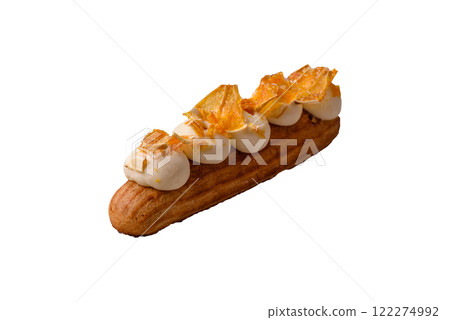 Sweet dessert eclairs or profiteroles with chocolate filling Sweet dessert eclairs or profiteroles with chocolate filling 122274992