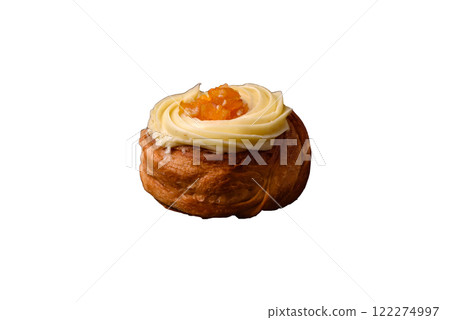 Sweet dessert danish with raisins, cream and pear filling 122274997