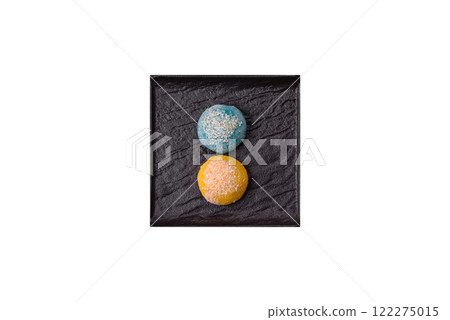 Delicious colorful asian mochi sweets with rice dough shell and fruit filling 122275015