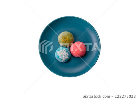 Delicious colorful asian mochi sweets with rice dough shell and fruit filling 122275028