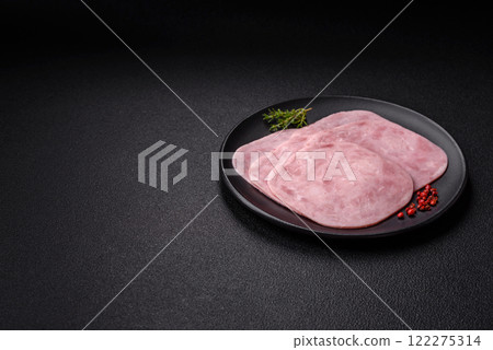 Ham, spam with salt, spices and herbs cut into slices 122275314
