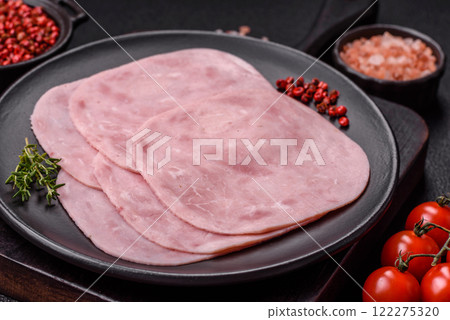 Ham, spam with salt, spices and herbs cut into slices 122275320