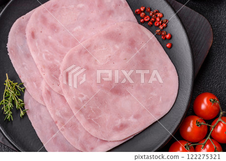Ham, spam with salt, spices and herbs cut into slices Ham, spam with salt, spices and herbs cut into slices 122275321