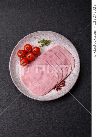 Ham, spam with salt, spices and herbs cut into slices Ham, spam with salt, spices and herbs cut into slices 122275328