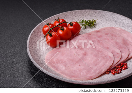 Ham, spam with salt, spices and herbs cut into slices Ham, spam with salt, spices and herbs cut into slices 122275329