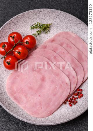 Ham, spam with salt, spices and herbs cut into slices 122275330