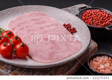 Ham, spam with salt, spices and herbs cut into slices 122275331