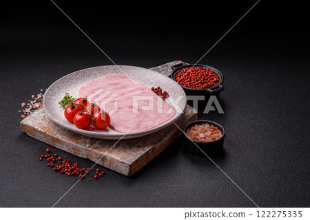 Ham, spam with salt, spices and herbs cut into slices 122275335