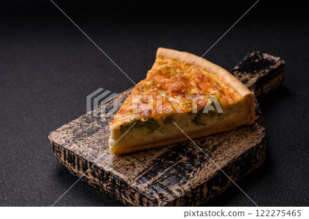 Delicious quiche with broccoli, chicken or salmon and cheese Delicious quiche with broccoli, chicken or salmon and cheese 122275465