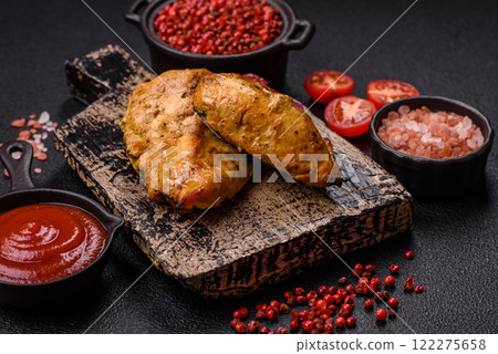 Chicken fillet pieces marinated with salt and spices 122275658