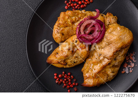 Chicken fillet pieces marinated with salt and spices Chicken fillet pieces marinated with salt and spices 122275670