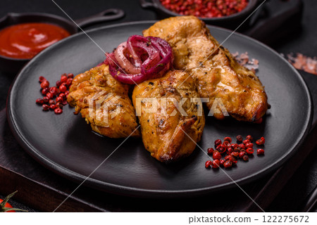 Chicken fillet pieces marinated with salt and spices Chicken fillet pieces marinated with salt and spices 122275672