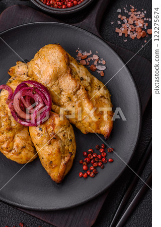 Chicken fillet pieces marinated with salt and spices Chicken fillet pieces marinated with salt and spices 122275674