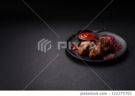 Pieces of beef meat cut into slices, marinated with salt and spices Pieces of beef meat cut into slices, marinated with salt and spices 122275701