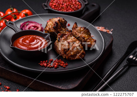 Pieces of beef meat cut into slices, marinated with salt and spices Pieces of beef meat cut into slices, marinated with salt and spices 122275707