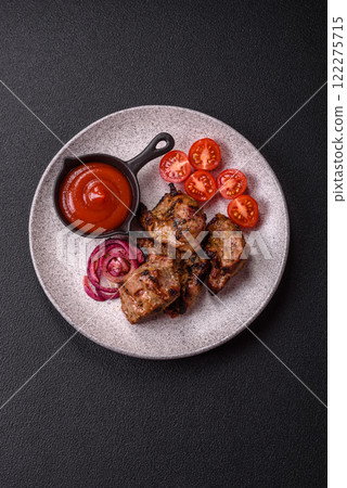 Pieces of beef meat cut into slices, marinated with salt and spices Pieces of beef meat cut into slices, marinated with salt and spices 122275715