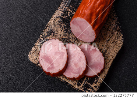 Smoked sausage or ham, cut into slices 122275777
