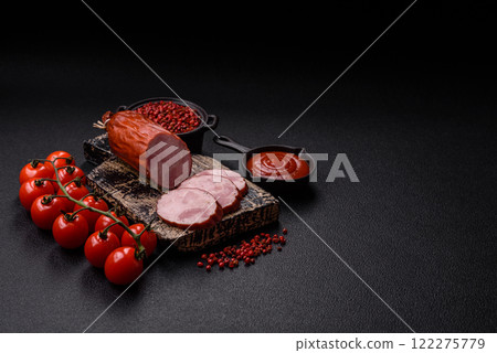 Smoked sausage or ham, cut into slices 122275779