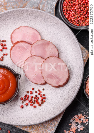 Smoked sausage or ham, cut into slices 122275799